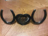 Anniversary horseshoes on a stand